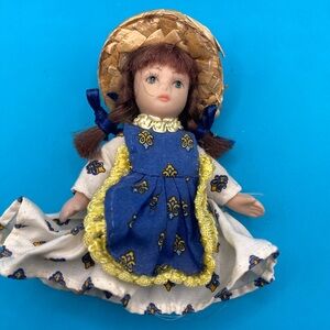 Les Poupeés de Mado Porcelain Doll Ornament, hand-painted in France.